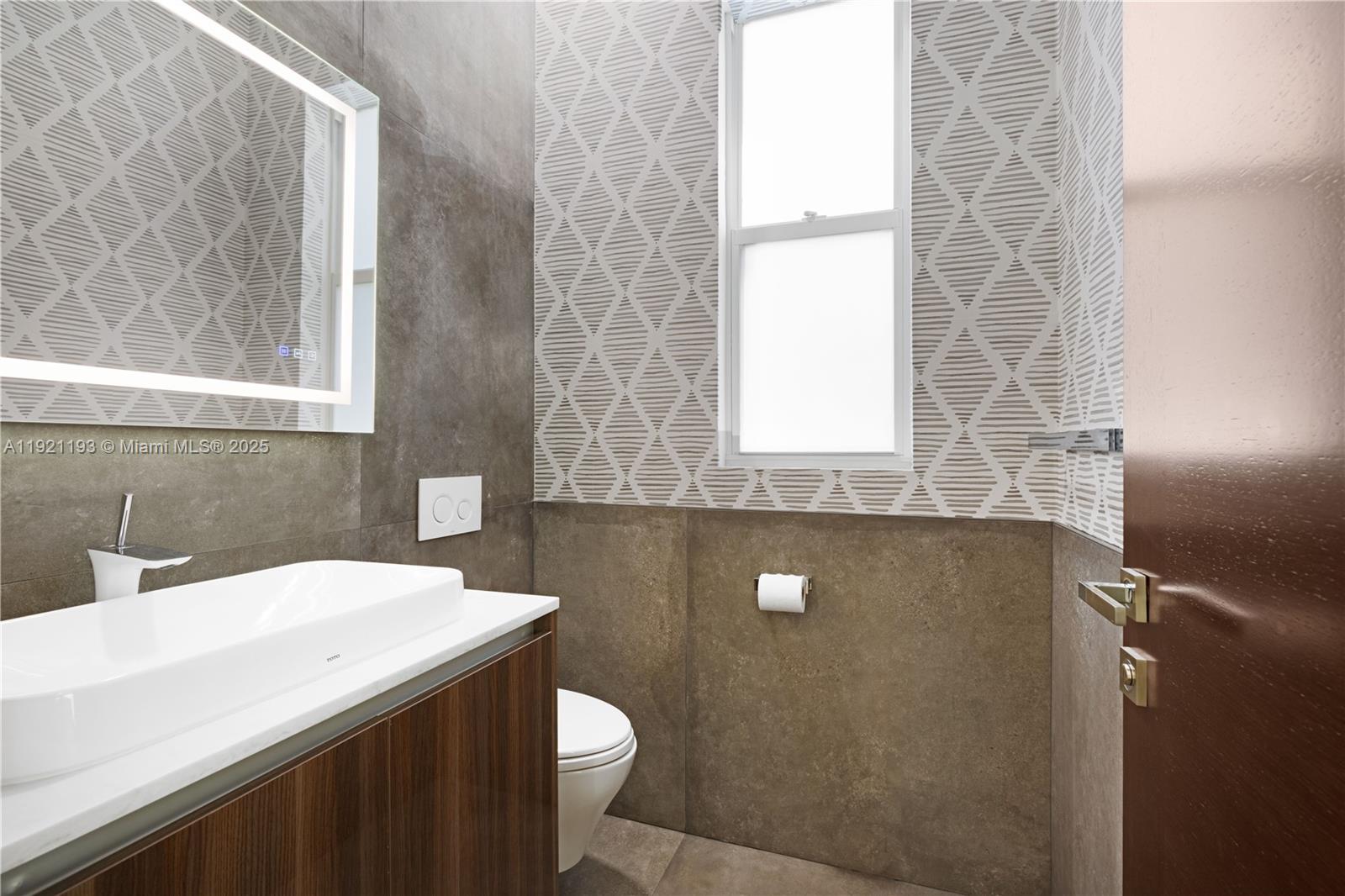 2420 Southwest 24th Street Miami, FL 33145 - Photo 47 of 53 Powder Room