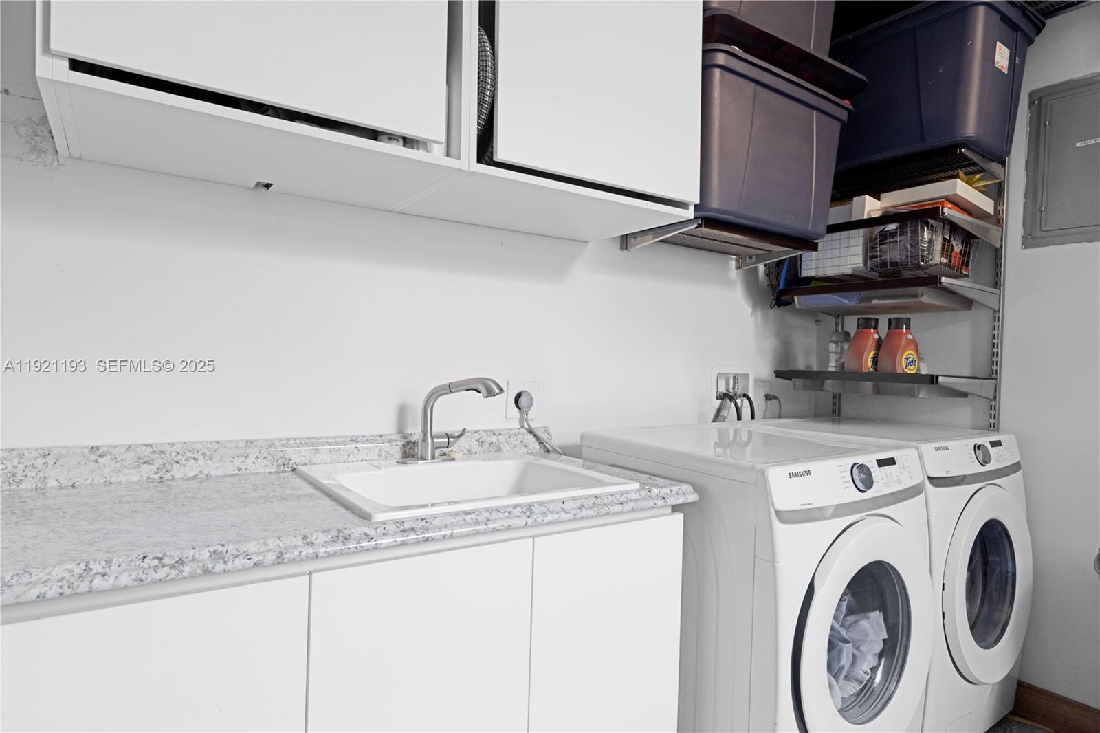 2420 Southwest 24th Street Miami, FL 33145 - Photo 49 of 53 a utility room with dryer and washer