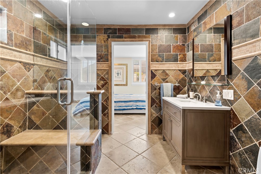 1000 Mandalay Beach Road Oxnard, CA 93035 - Photo 16 of 33 a bathroom with a sink and mirror