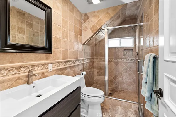 a bathroom with a sink and a toilet