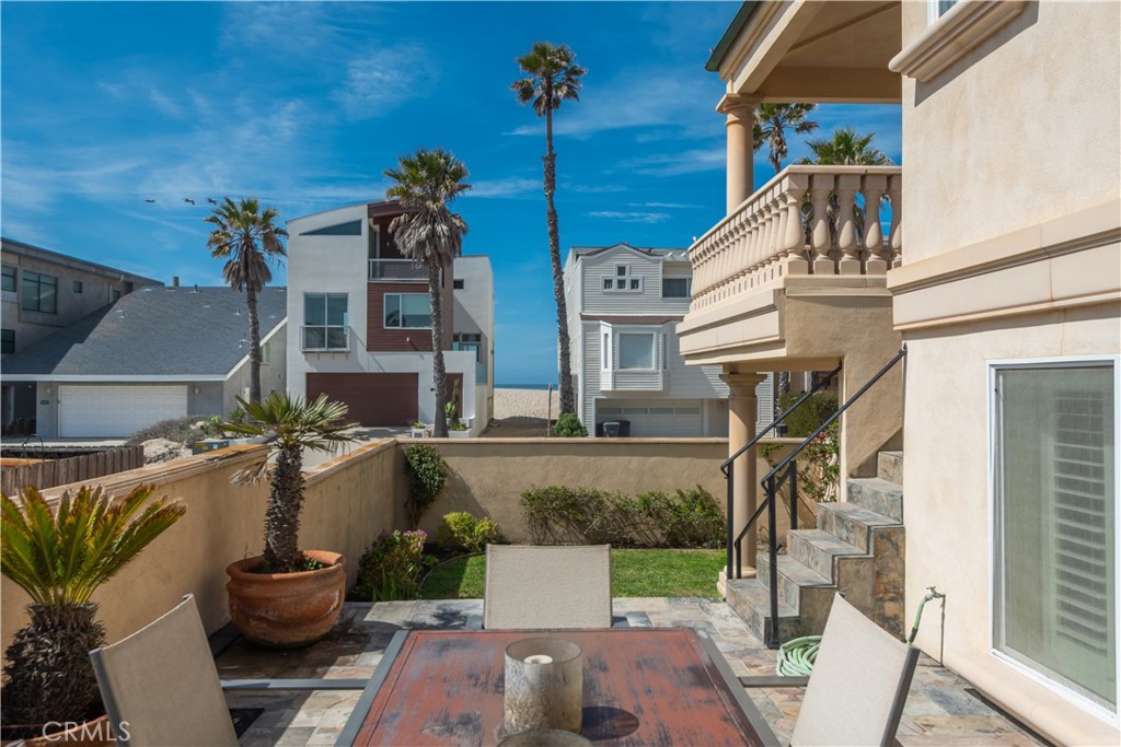 1000 Mandalay Beach Road Oxnard, CA 93035 - Photo 7 of 33 a front view of a house with a fountain