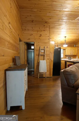 a living room with furniture flat screen tv and a fireplace