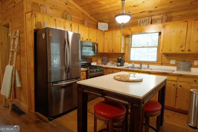 a bathroom with a shower and a toilet