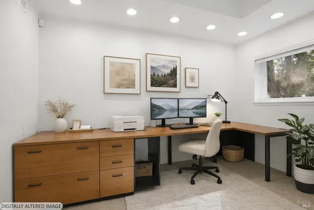 a view of a workspace with furniture