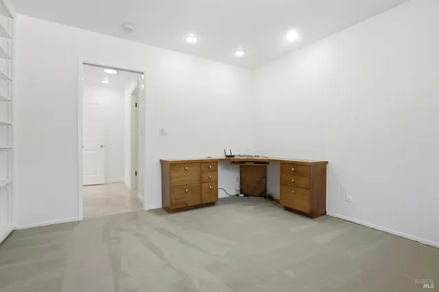 a view of a big room with wooden wall