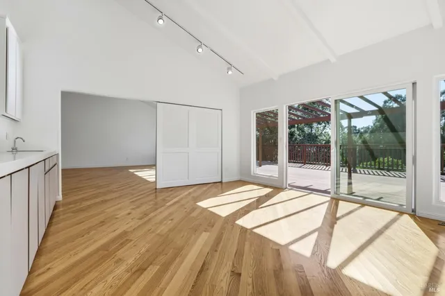 a view of an empty room and window