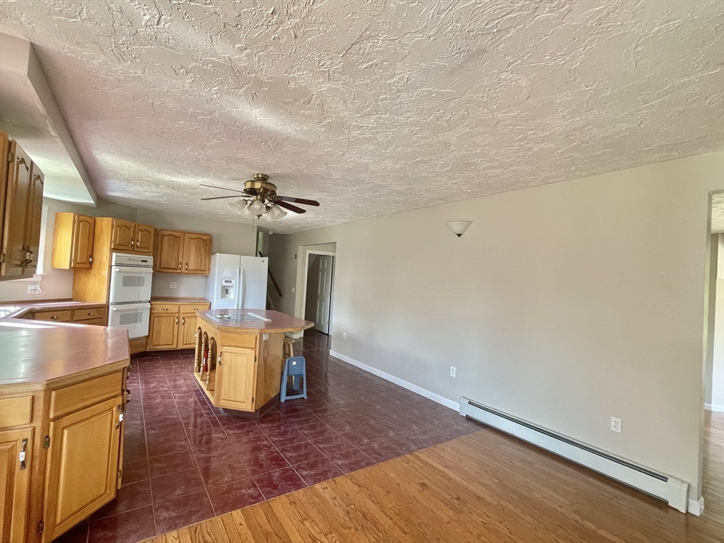 43 Tower Hill Road Brimfield, MA 01010 - Photo 15 of 36 a view of a dining room with furniture window and wooden floor