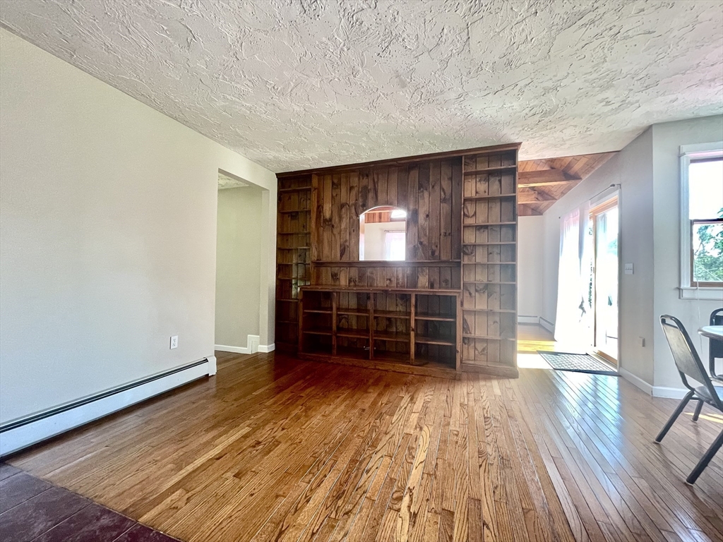 43 Tower Hill Road Brimfield, MA 01010 - Photo 17 of 36 wooden floor in an empty room with a window