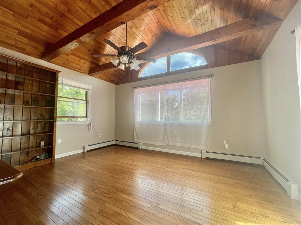 43 Tower Hill Road Brimfield, MA 01010 - Photo 19 of 36 an empty room with wooden floor and windows