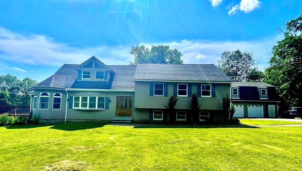 43 Tower Hill Road Brimfield, MA 01010 - Photo 2 of 36 a view of a house with a swimming pool