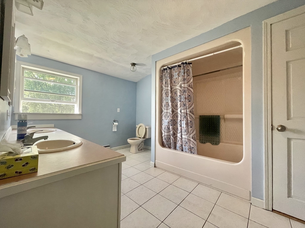 43 Tower Hill Road Brimfield, MA 01010 - Photo 21 of 36 a living room with furniture and a fireplace