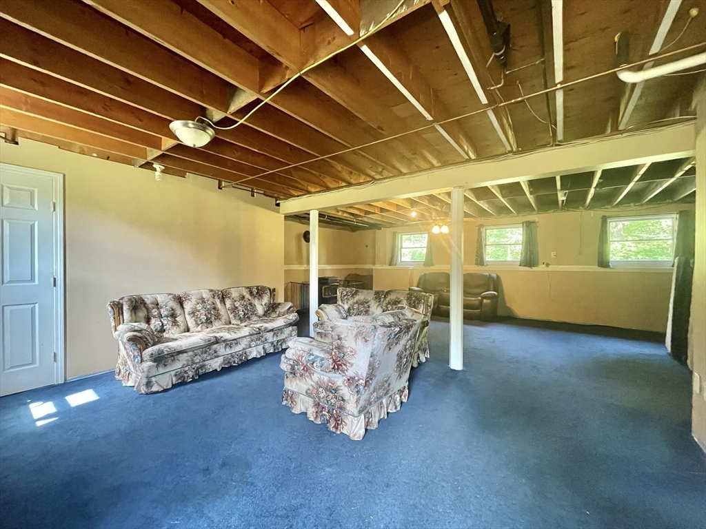 43 Tower Hill Road Brimfield, MA 01010 - Photo 32 of 36 a living room with furniture and a gym