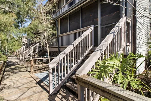 an aerial view of residential house with outdoor space and swimming pool