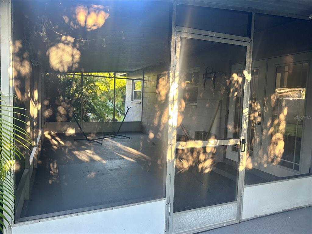 501 Firefly Lane Apollo Beach, FL 33572 - Photo 3 of 17 a view of a glass door