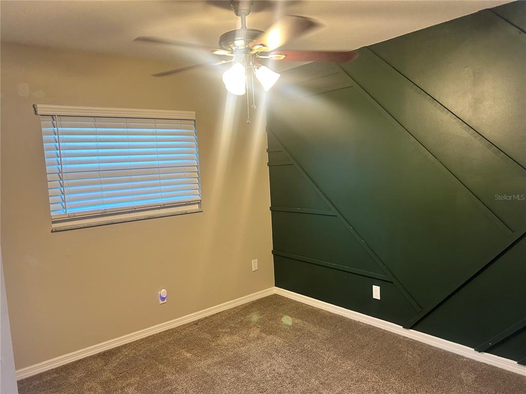 501 Firefly Lane Apollo Beach, FL 33572 - Photo 10 of 17 a view of a room with a fan