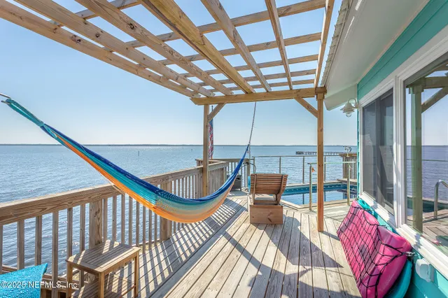 a view of staircase with a swimming pool