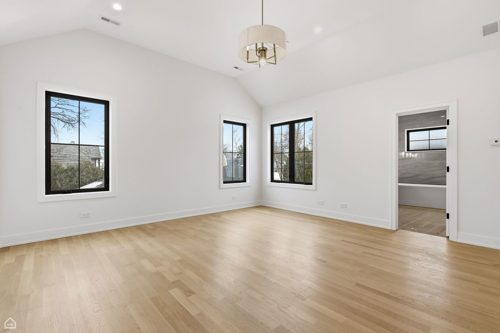 135 Elmore Street Park Ridge, IL 60068 - Photo 11 of 23 a view of an empty room with window and wooden floor