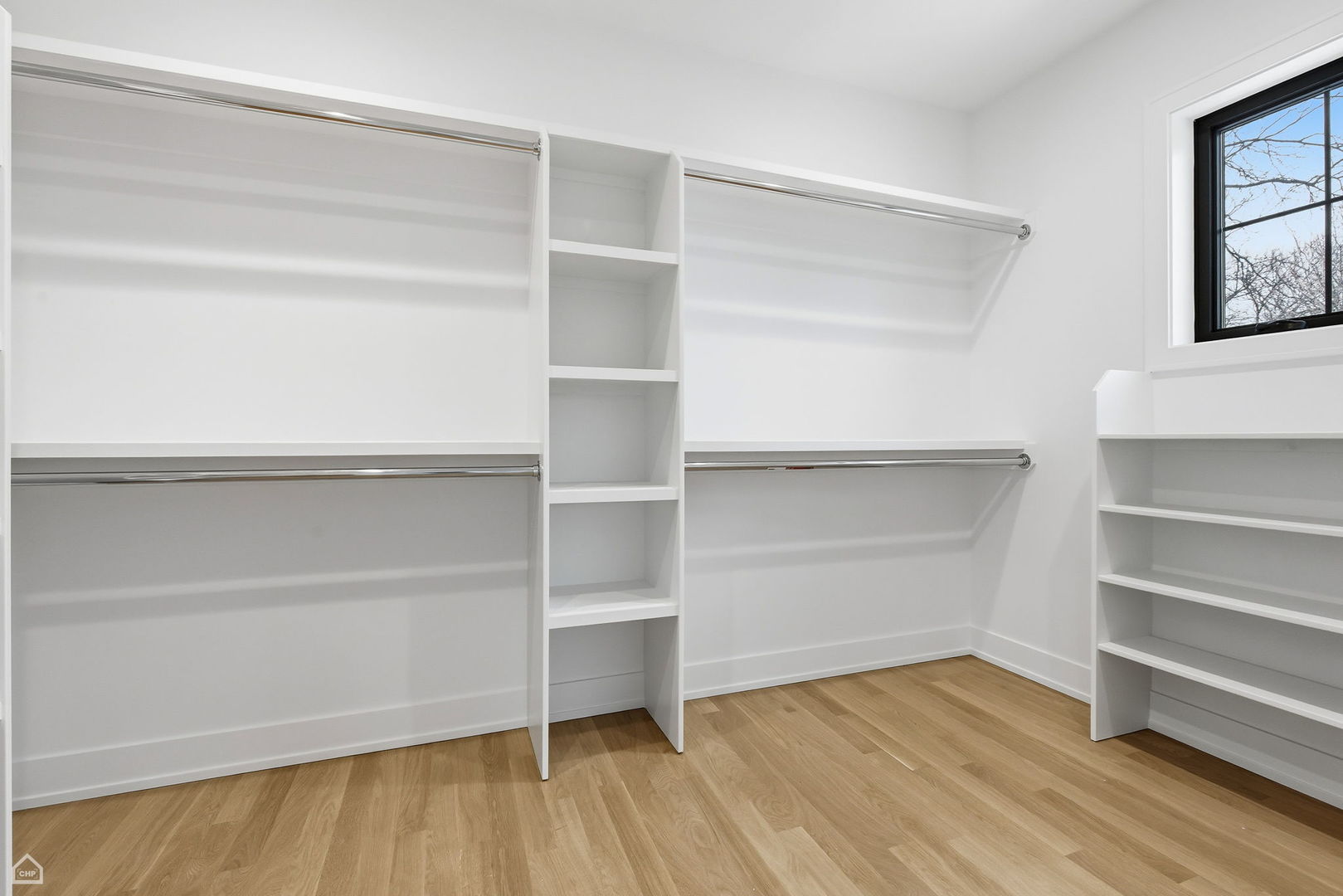 135 Elmore Street Park Ridge, IL 60068 - Photo 15 of 23 a view of walk in closet with empty racks