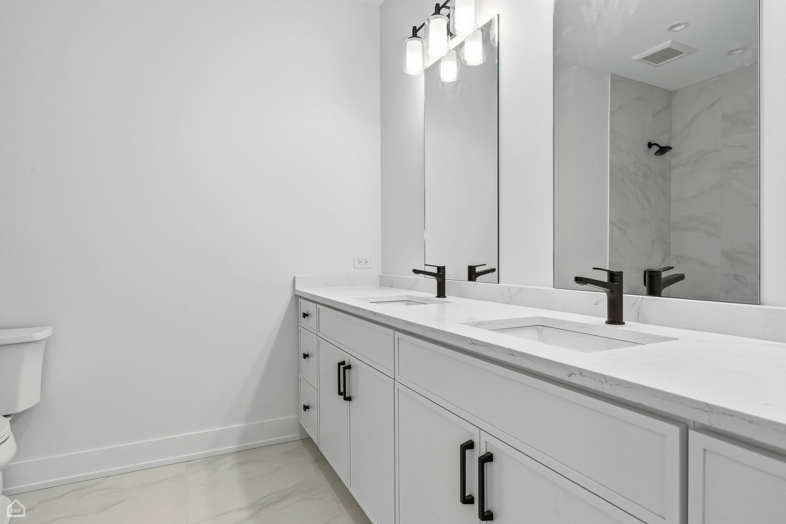 135 Elmore Street Park Ridge, IL 60068 - Photo 17 of 23 a bathroom with a sink and a mirror