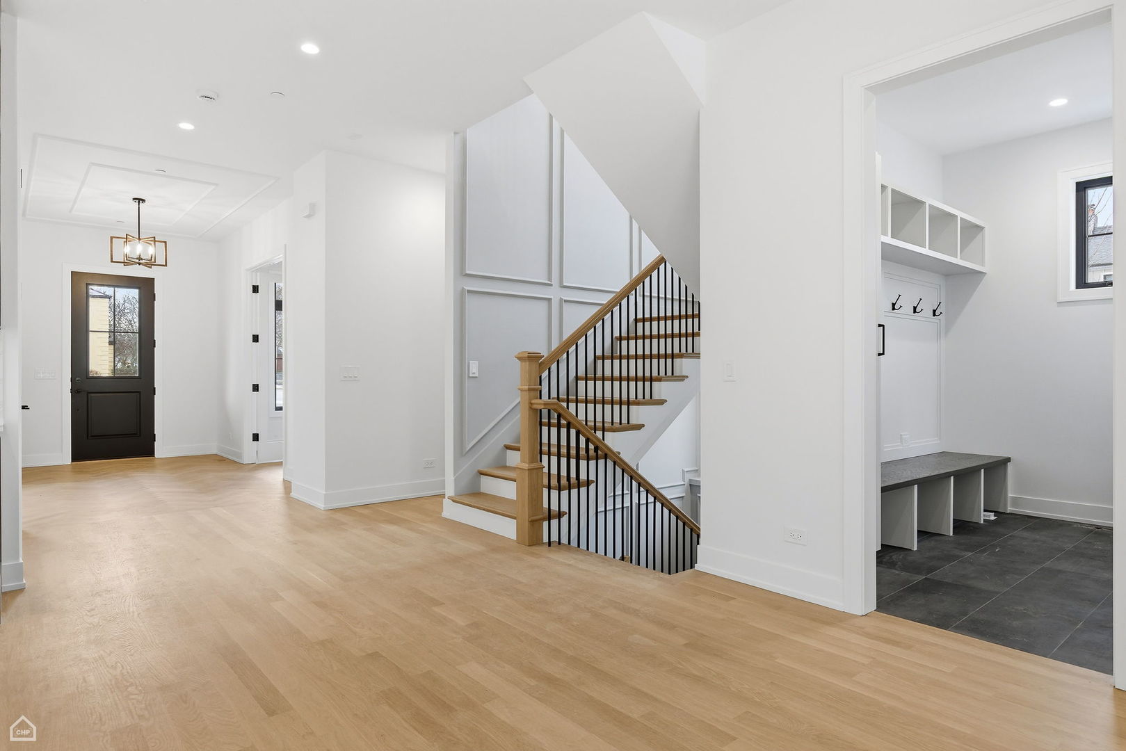 135 Elmore Street Park Ridge, IL 60068 - Photo 9 of 23 a view of empty room with wooden floor and fan