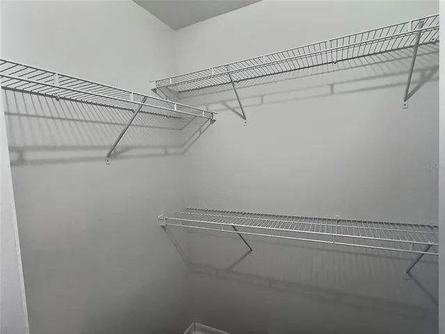 a view of a room with racks on the wall