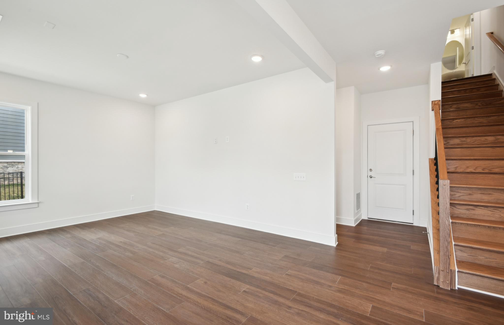 42601 Houdini Rst Terrace Leesburg, VA 20176 - Photo 4 of 52 wooden floor in an empty room with a window