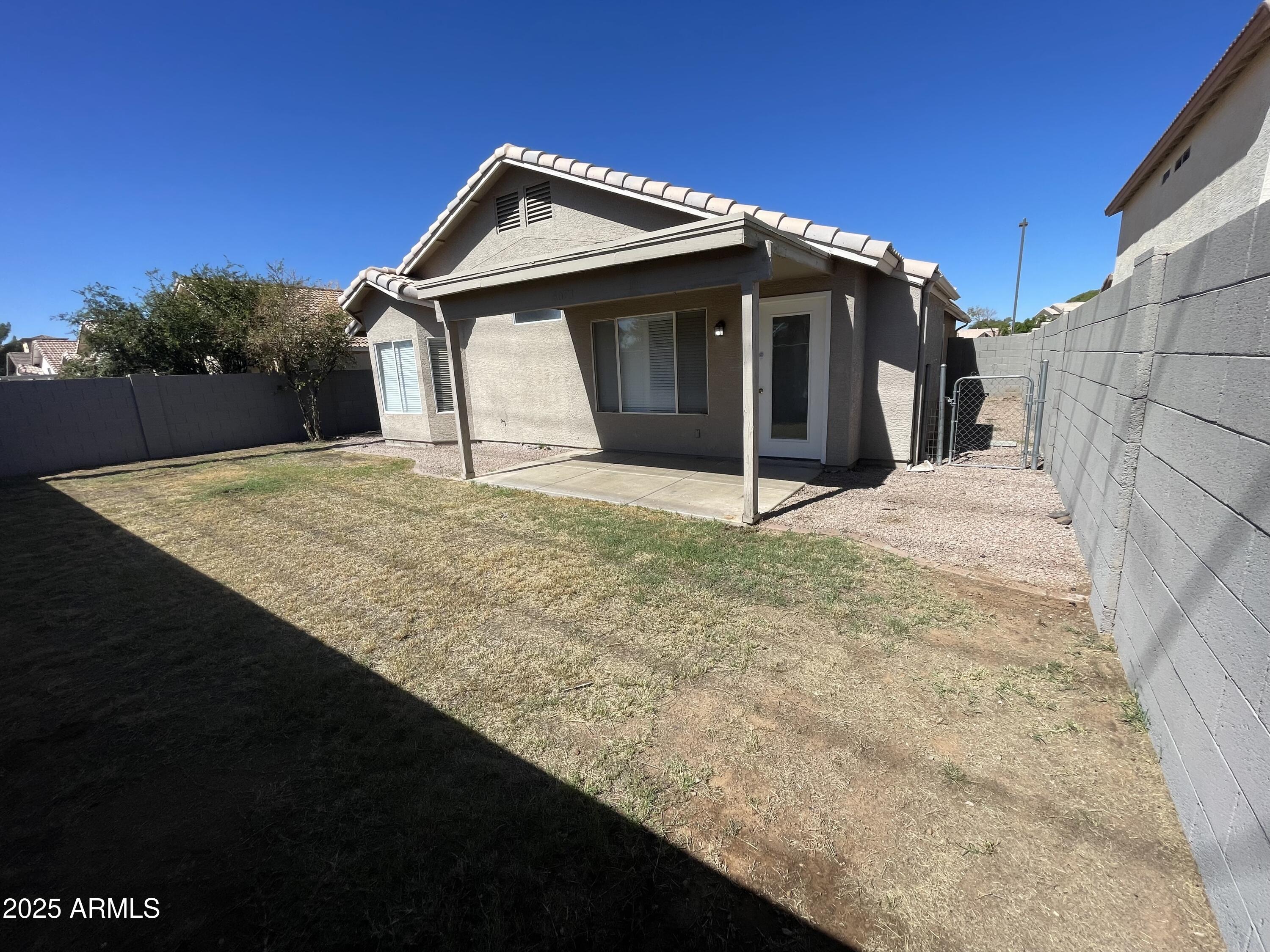 4073 East Princeton Avenue Gilbert, AZ 85234 - Photo 6 of 6 a view of a house with a outdoor space
