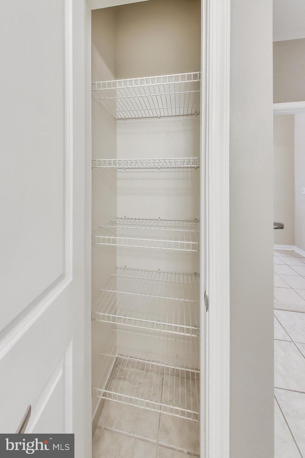 8045 Newell Street, Unit 108 Silver Spring, MD 20910 - Photo 19 of 33 a bathroom with a glass shower door