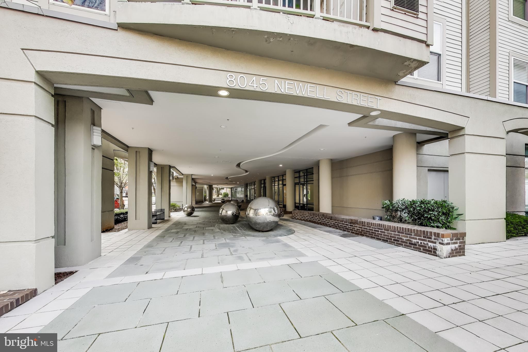 8045 Newell Street, Unit 108 Silver Spring, MD 20910 - Photo 28 of 33 a view of a porch with seating space