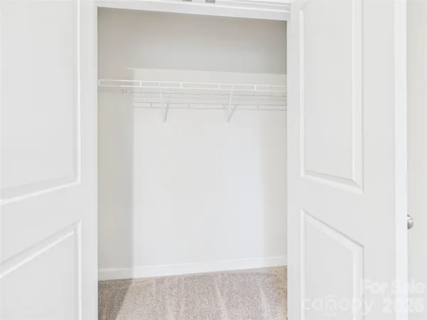 a bathroom with a sink double vanity and a mirror