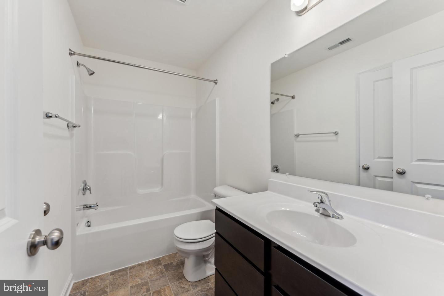 3801 Castle Drive Dover, PA 17315 - Photo 13 of 22 a bathroom with a sink toilet tub and shower