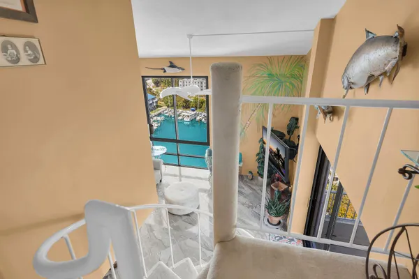 a balcony with furniture and city view