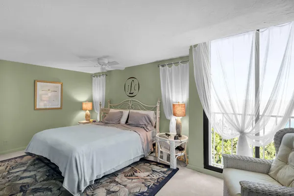 a view of a lake with tall building