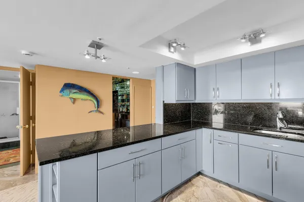 a view of a swimming pool and a yard