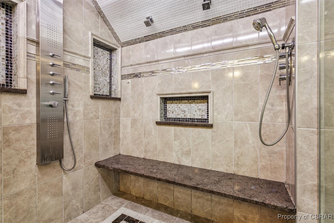 1318 Showalter Road Yorktown, VA 23692 - Photo 26 of 47 Bathroom with tiled shower and lofted ceiling