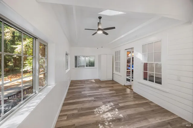 a view of empty room with windows