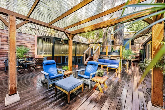 a sitting area with furniture