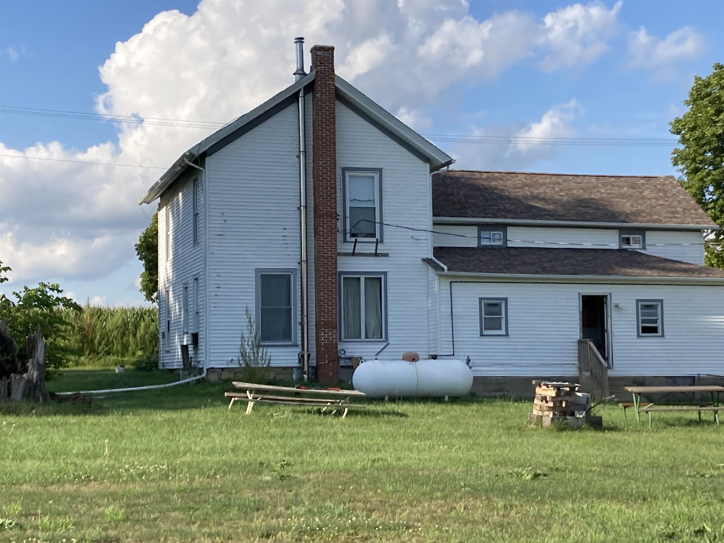 15702 Farm School Road Durand, IL 61024 - Photo 13 of 38 front view of a house with a yard