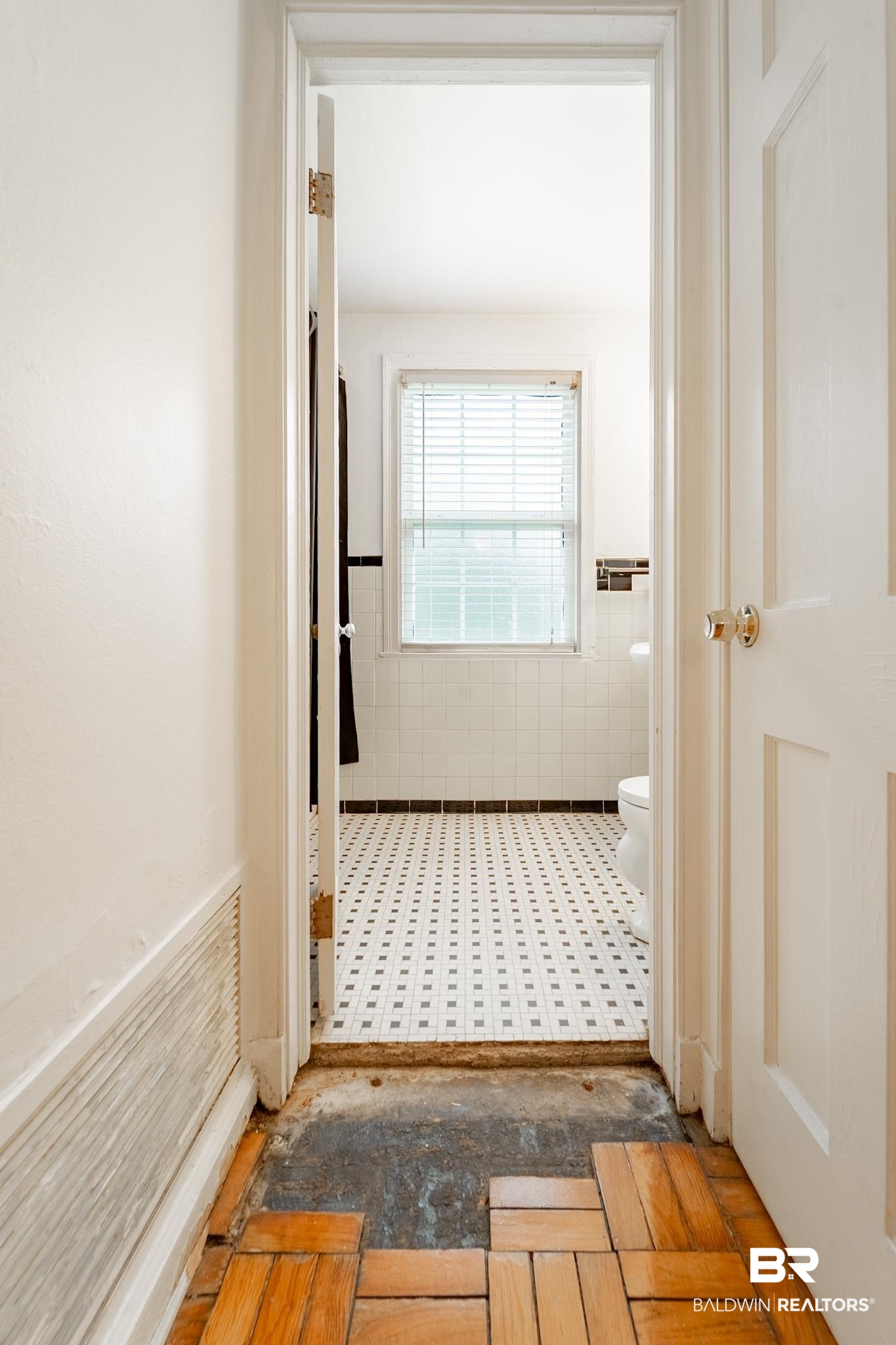 214 Upham Street, Unit 51A Mobile, AL 36607 - Photo 16 of 16 Hallway featuring tile walls