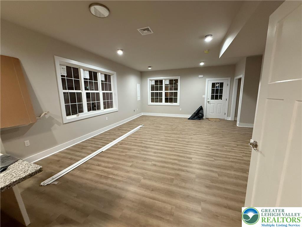 1722 Williams Street Hellertown, PA 18055 - Photo 5 of 12 a view of empty room with windows