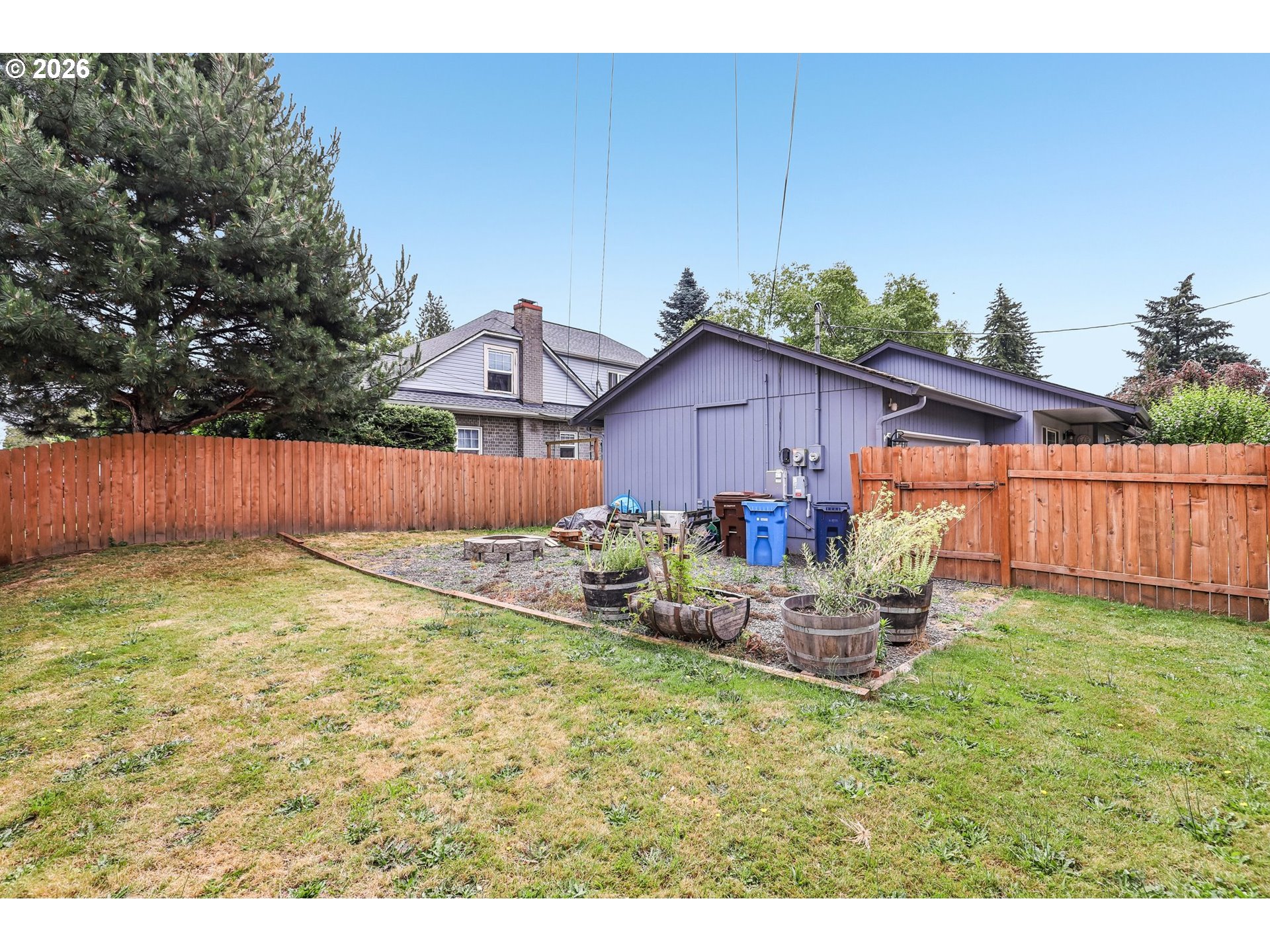 608 Southeast Sumner Street Camas, WA 98607 - Photo 28 of 39 a backyard of a house with wooden fence