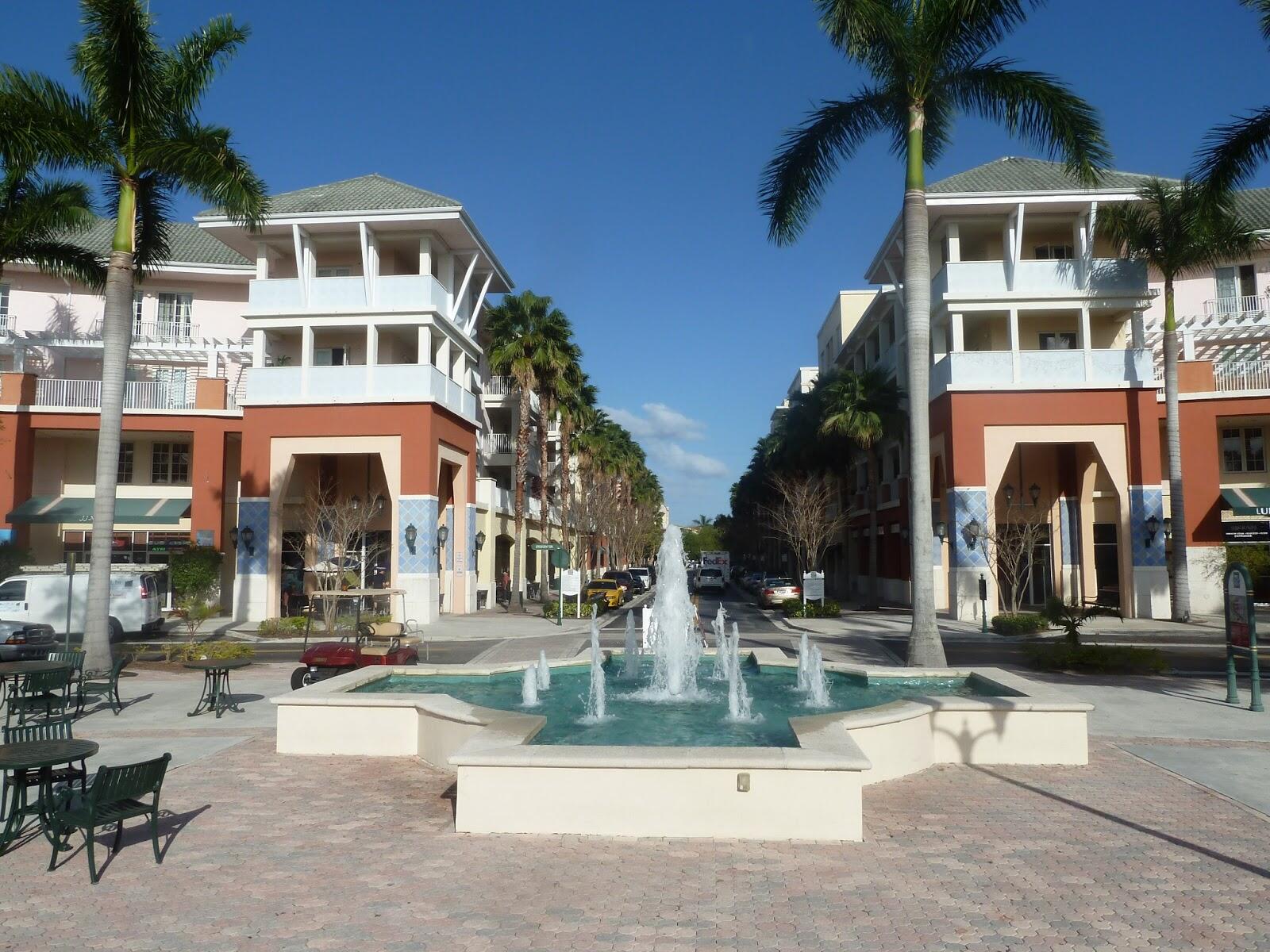 263 Caravelle Drive Jupiter, FL 33458 - Photo 12 of 14 a view of a building with a fountain in front of it