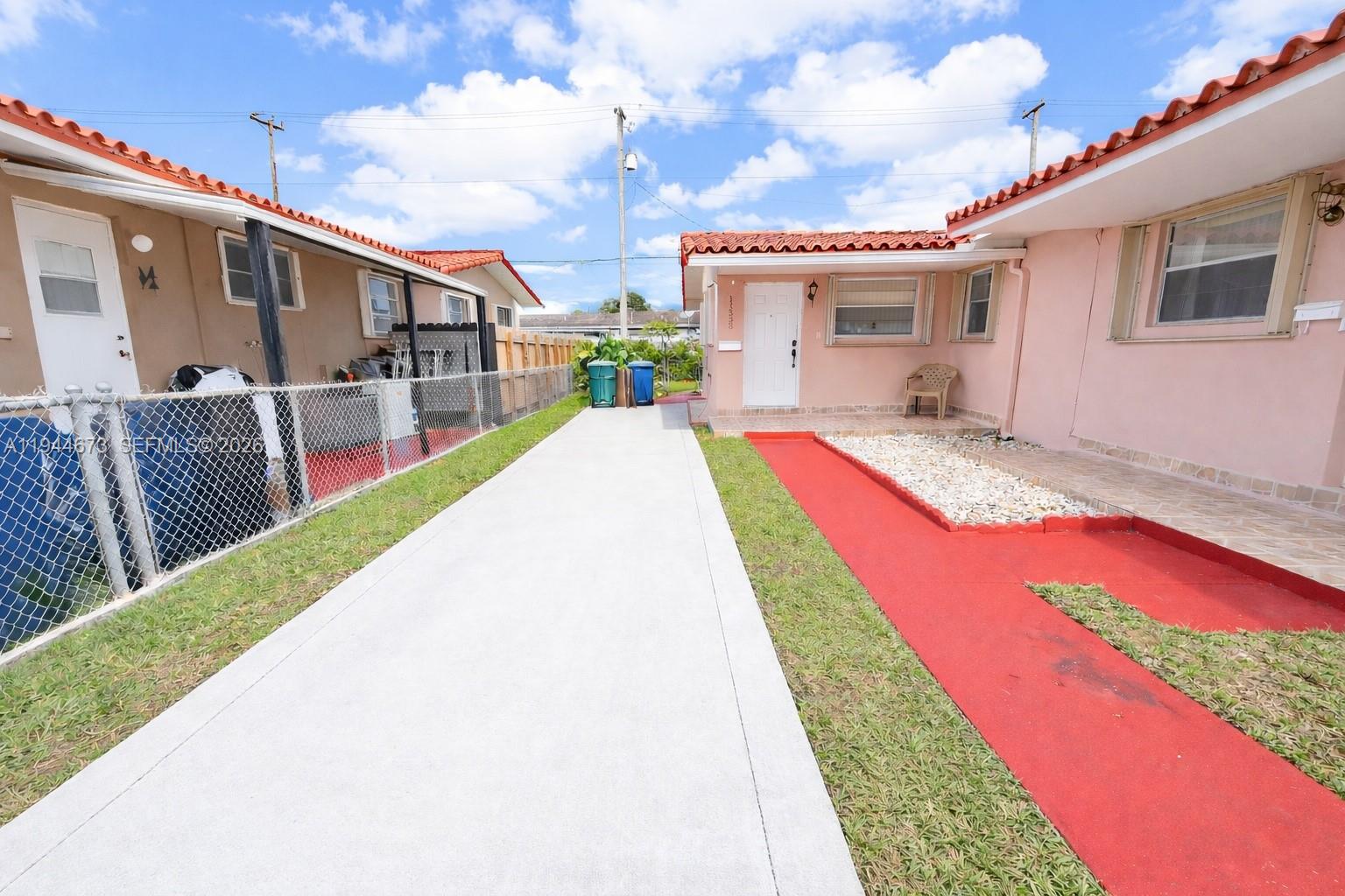 a view of swimming pool with a backyard