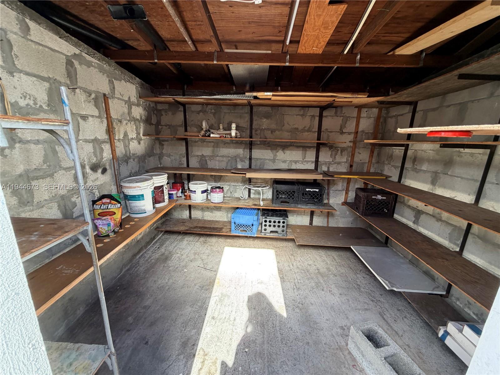 11333 Southwest 7th Terrace Sweetwater, FL 33174 - Photo 13 of 13 a storage room with washer and dryer