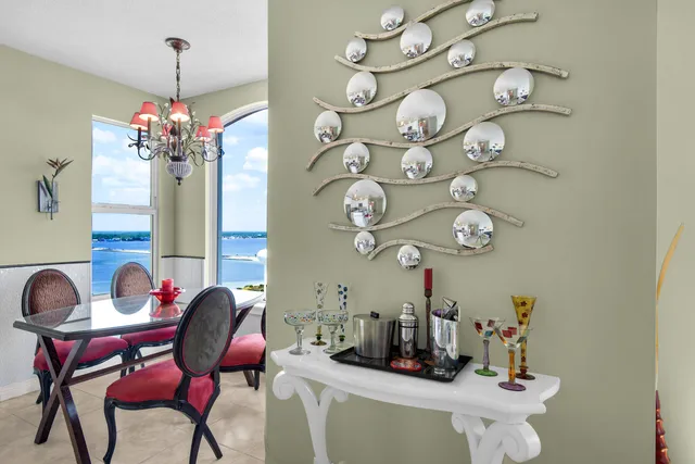 a kitchen with stainless steel appliances a refrigerator sink and microwave