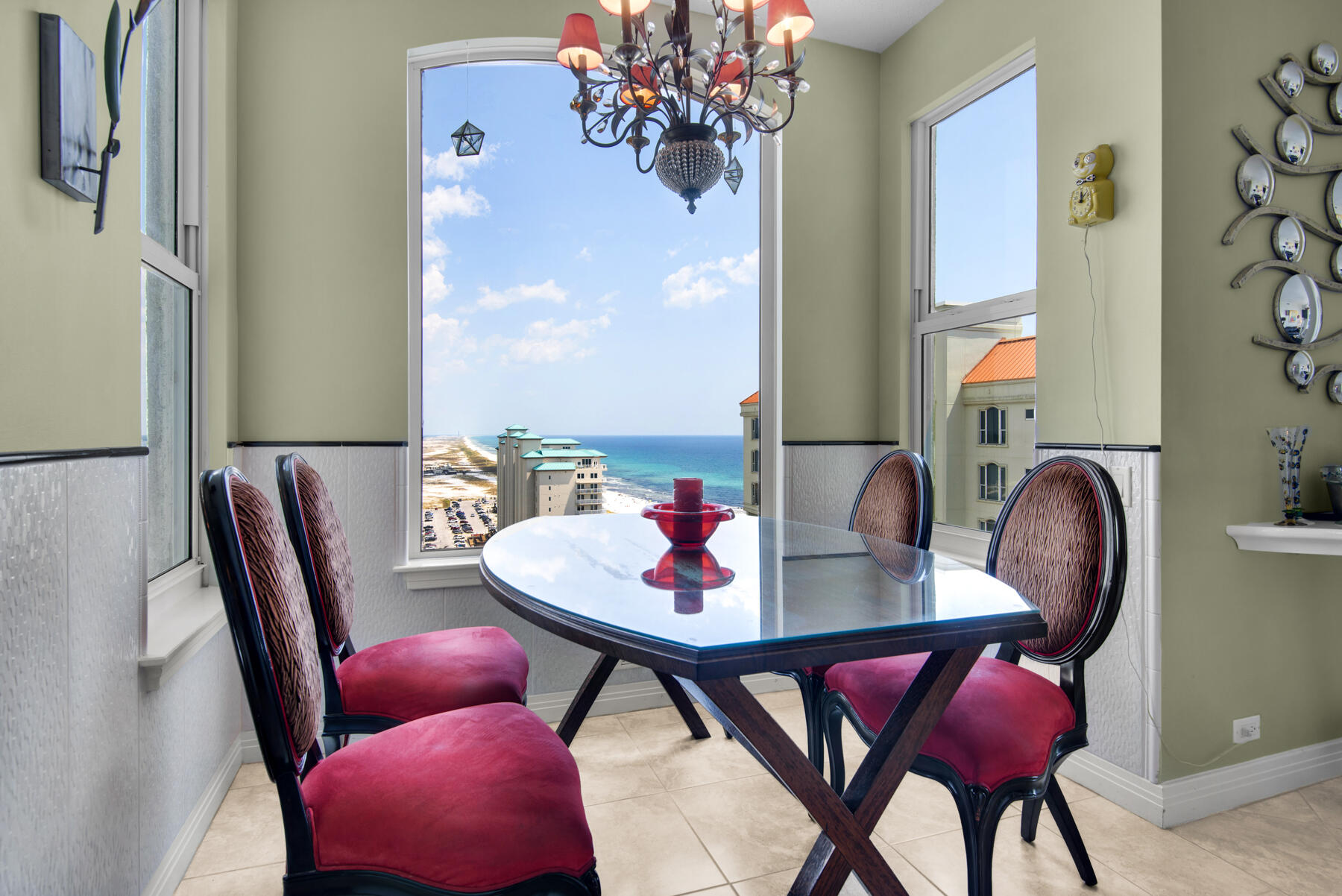 8501 Gulf Boulevard, Unit WPH3A Navarre, FL 32566 - Photo 15 of 66 a view of a dining room with furniture and chandelier