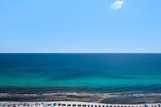 a bathroom with 2 sink and a mirror