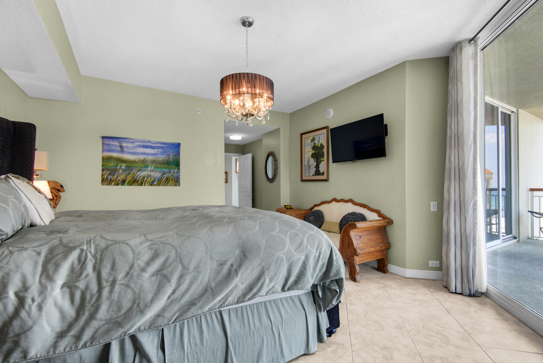 8501 Gulf Boulevard, Unit WPH3A Navarre, FL 32566 - Photo 32 of 66 a bedroom with a bed and a flat screen tv