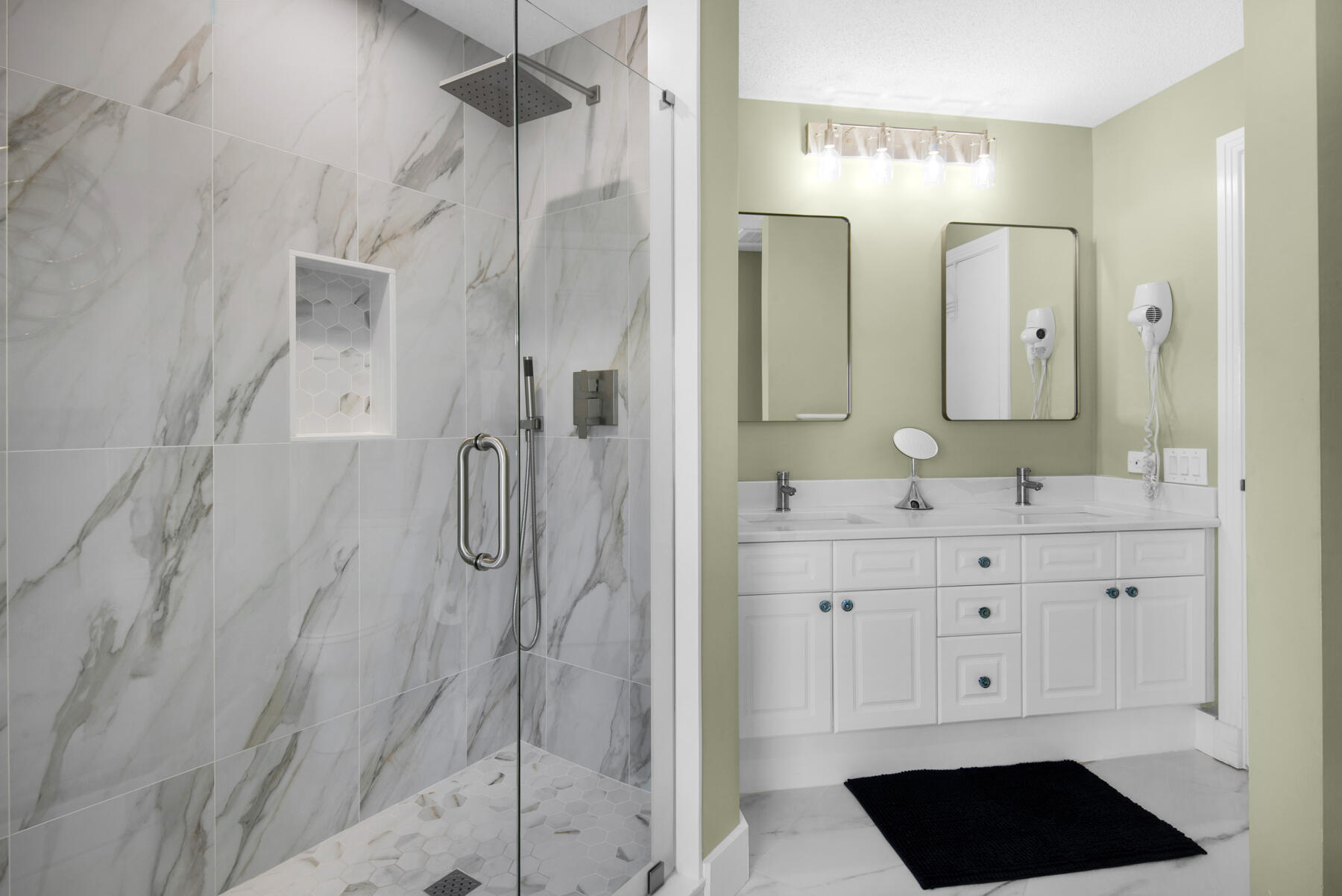 8501 Gulf Boulevard, Unit WPH3A Navarre, FL 32566 - Photo 36 of 66 a bathroom with a double vanity sink mirror and shower