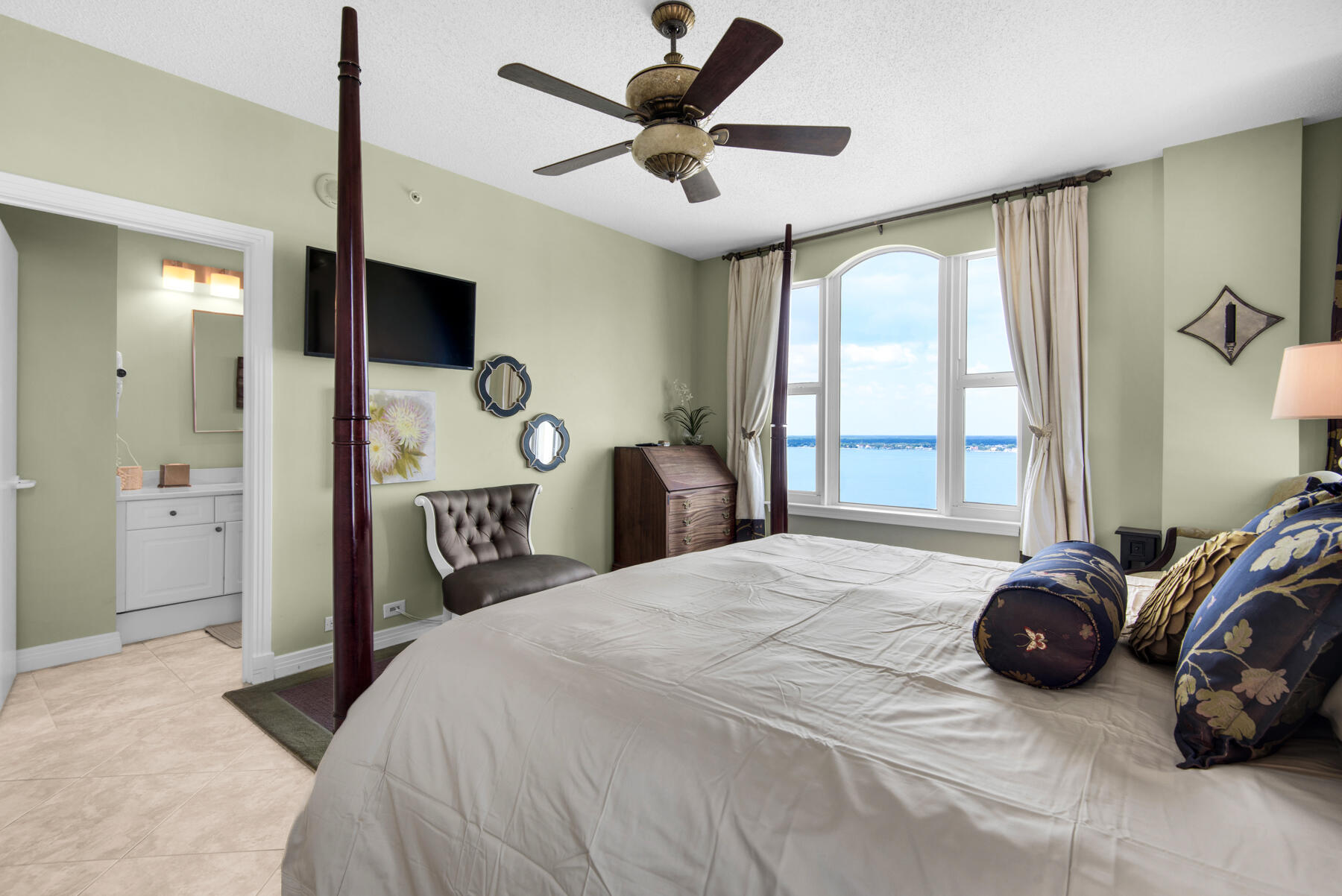 8501 Gulf Boulevard, Unit WPH3A Navarre, FL 32566 - Photo 38 of 66 a bedroom with a bed and a large window